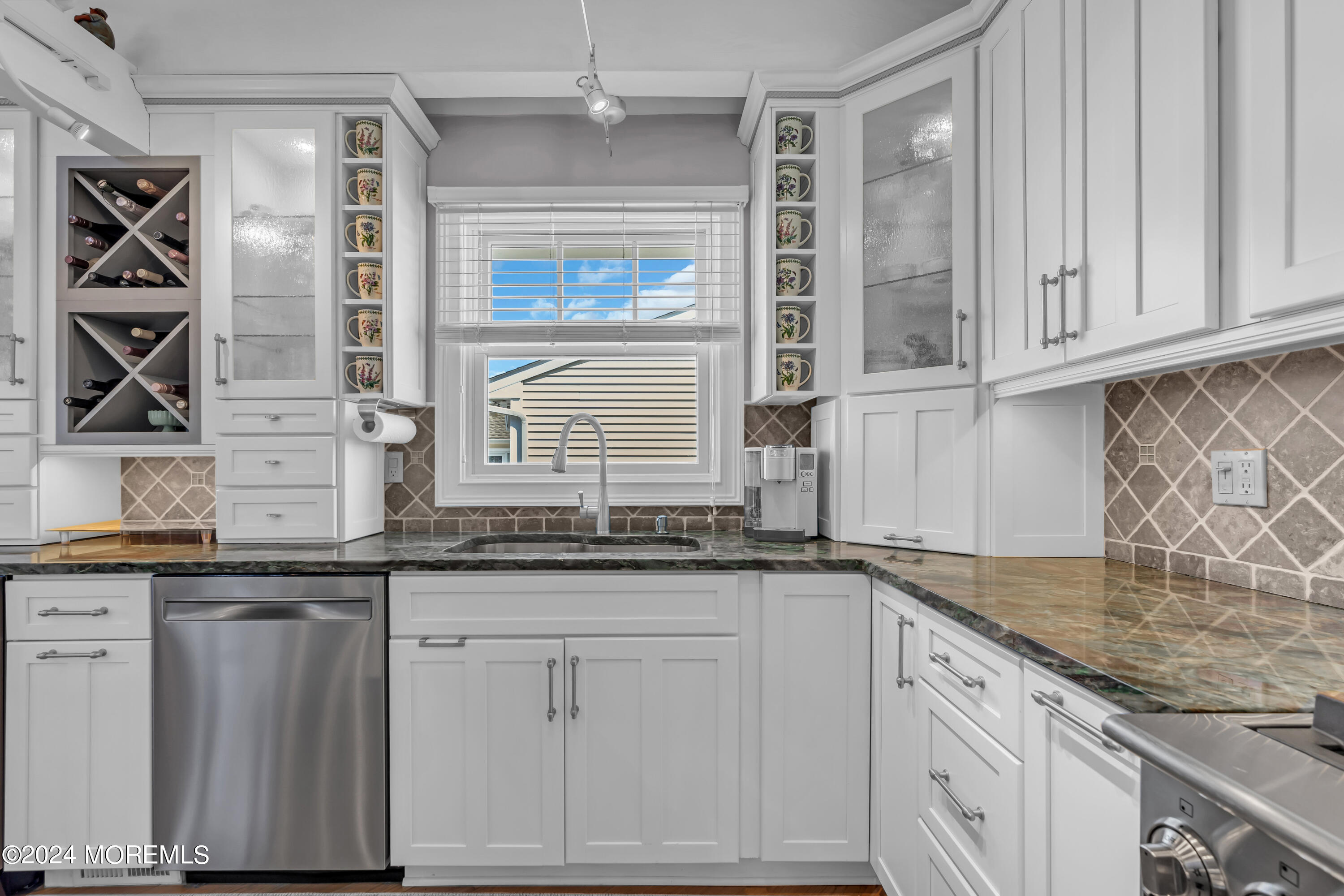 381 Aldo Drive Toms River, NJ 08753 - Photo 16 of 58 a kitchen with granite countertop a sink and cabinets