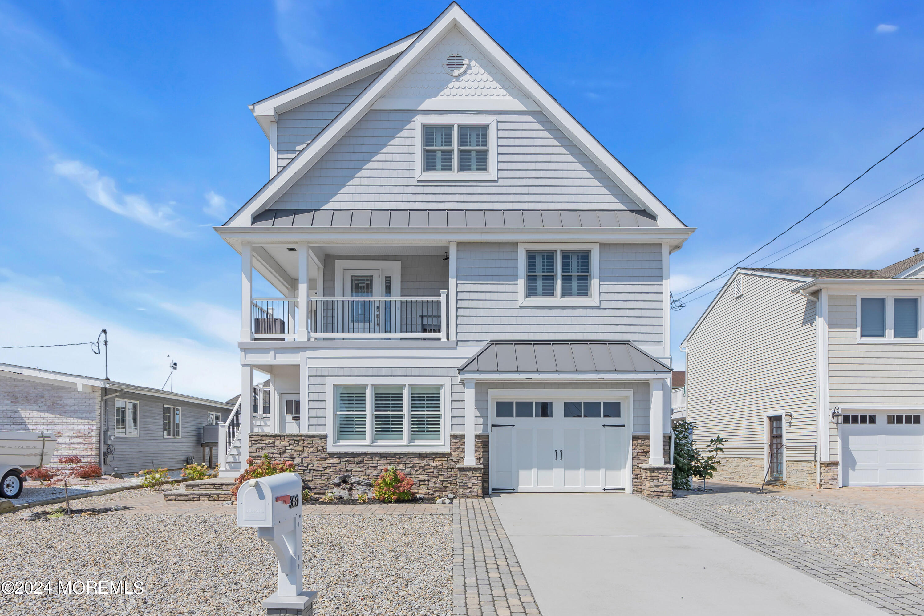 381 Aldo Drive Toms River, NJ 08753 - Photo 2 of 58 a front view of a house with a patio