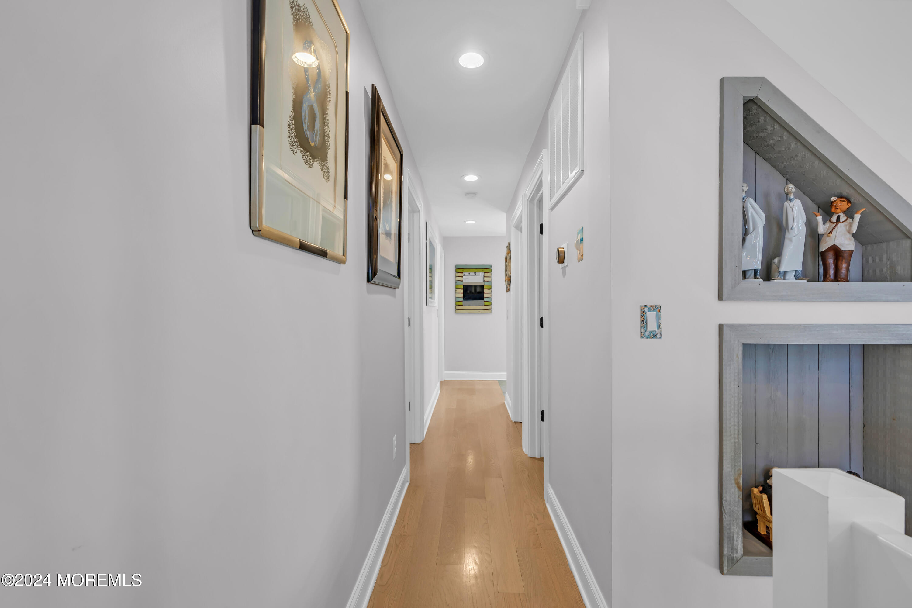 381 Aldo Drive Toms River, NJ 08753 - Photo 23 of 58 a view of a hallway with wooden floor and staircase