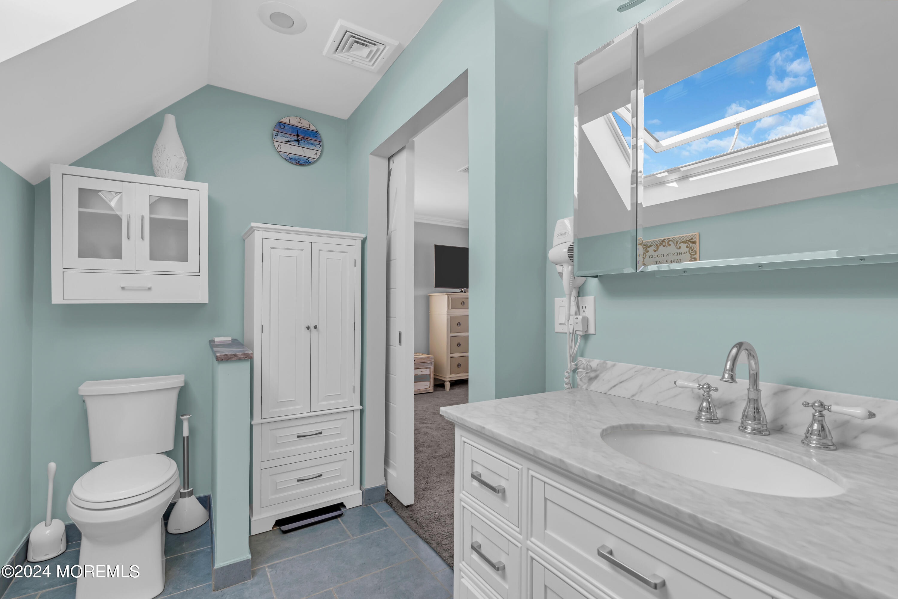 381 Aldo Drive Toms River, NJ 08753 - Photo 26 of 58 a bathroom with a granite countertop toilet sink and mirror