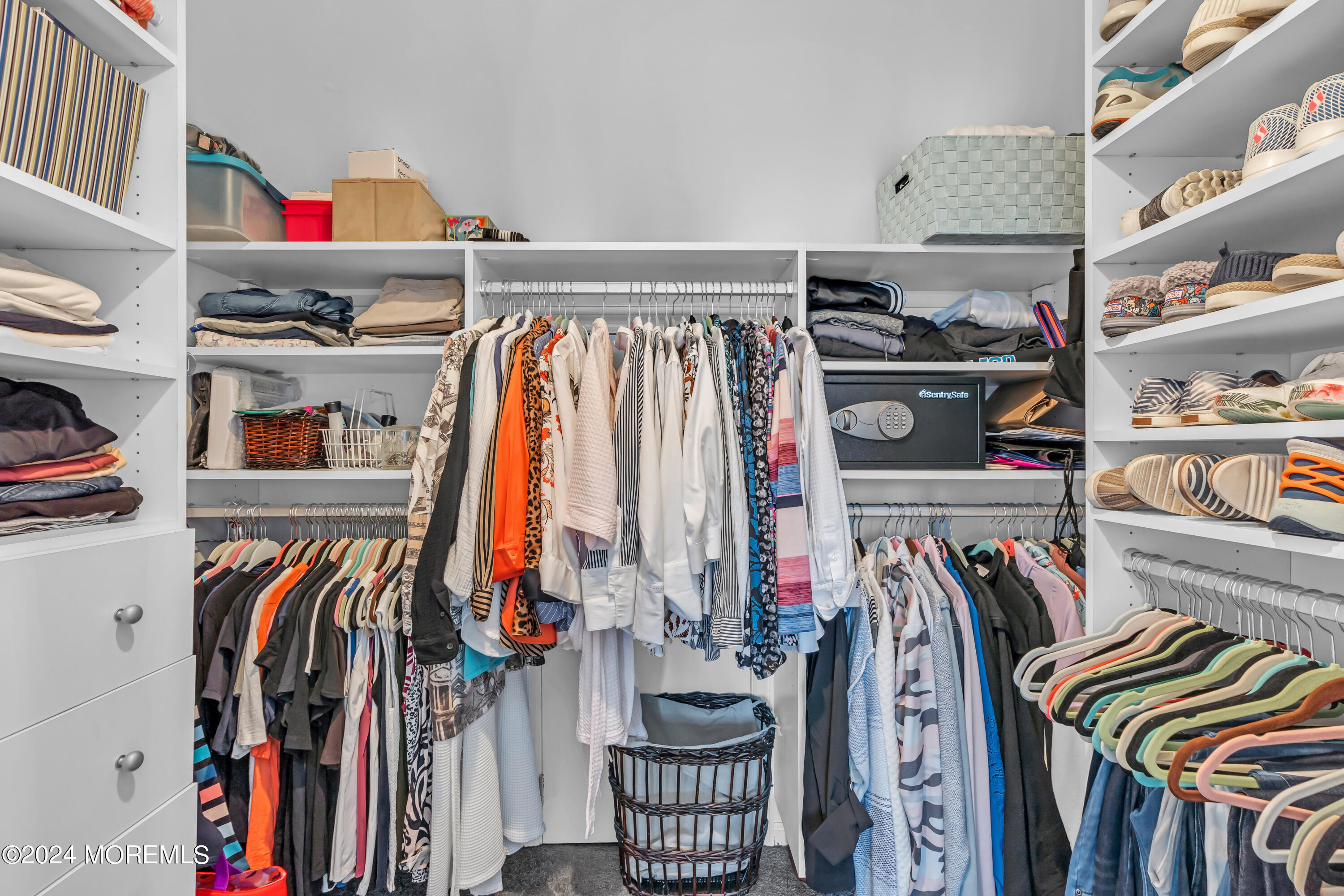 381 Aldo Drive Toms River, NJ 08753 - Photo 27 of 58 a view of walk in closet with clothes and shoes