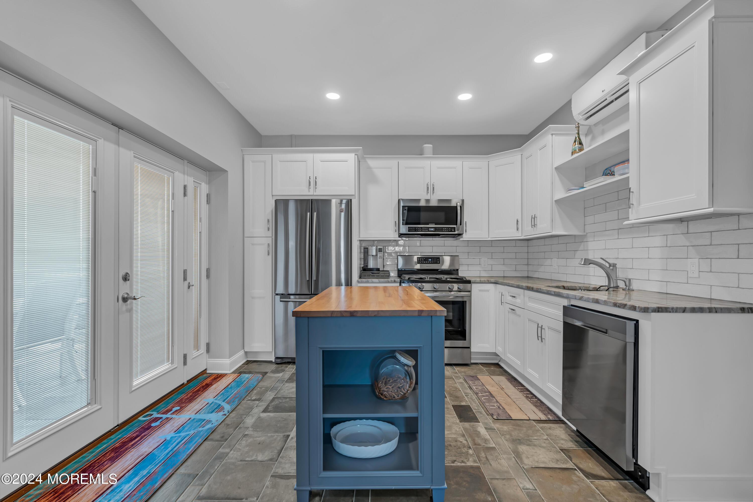 381 Aldo Drive Toms River, NJ 08753 - Photo 29 of 58 a kitchen that has a lot of cabinets in it and appliances