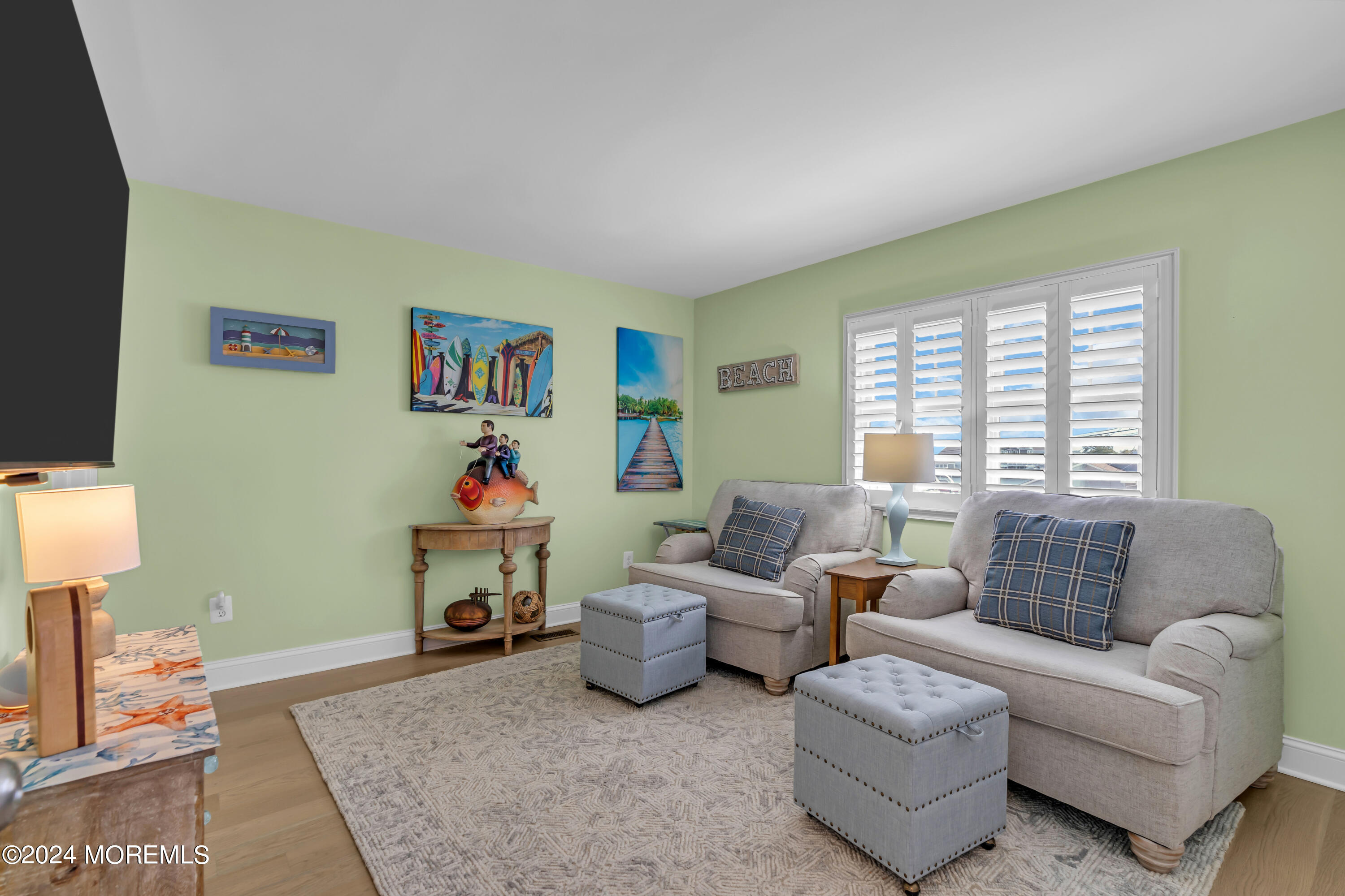 381 Aldo Drive Toms River, NJ 08753 - Photo 32 of 58 a living room with furniture and a window