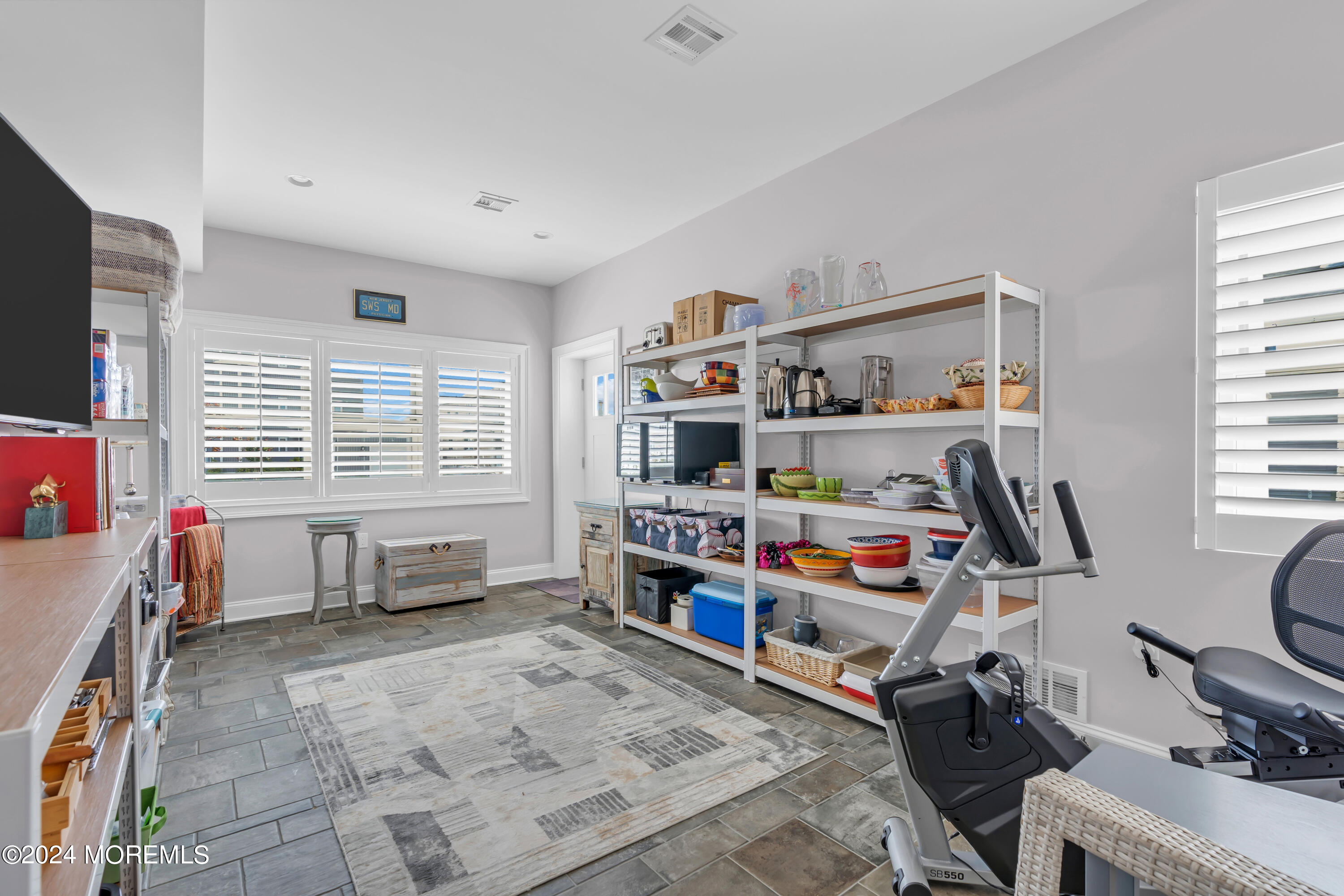 381 Aldo Drive Toms River, NJ 08753 - Photo 37 of 58 a view of a workspace with furniture and a window