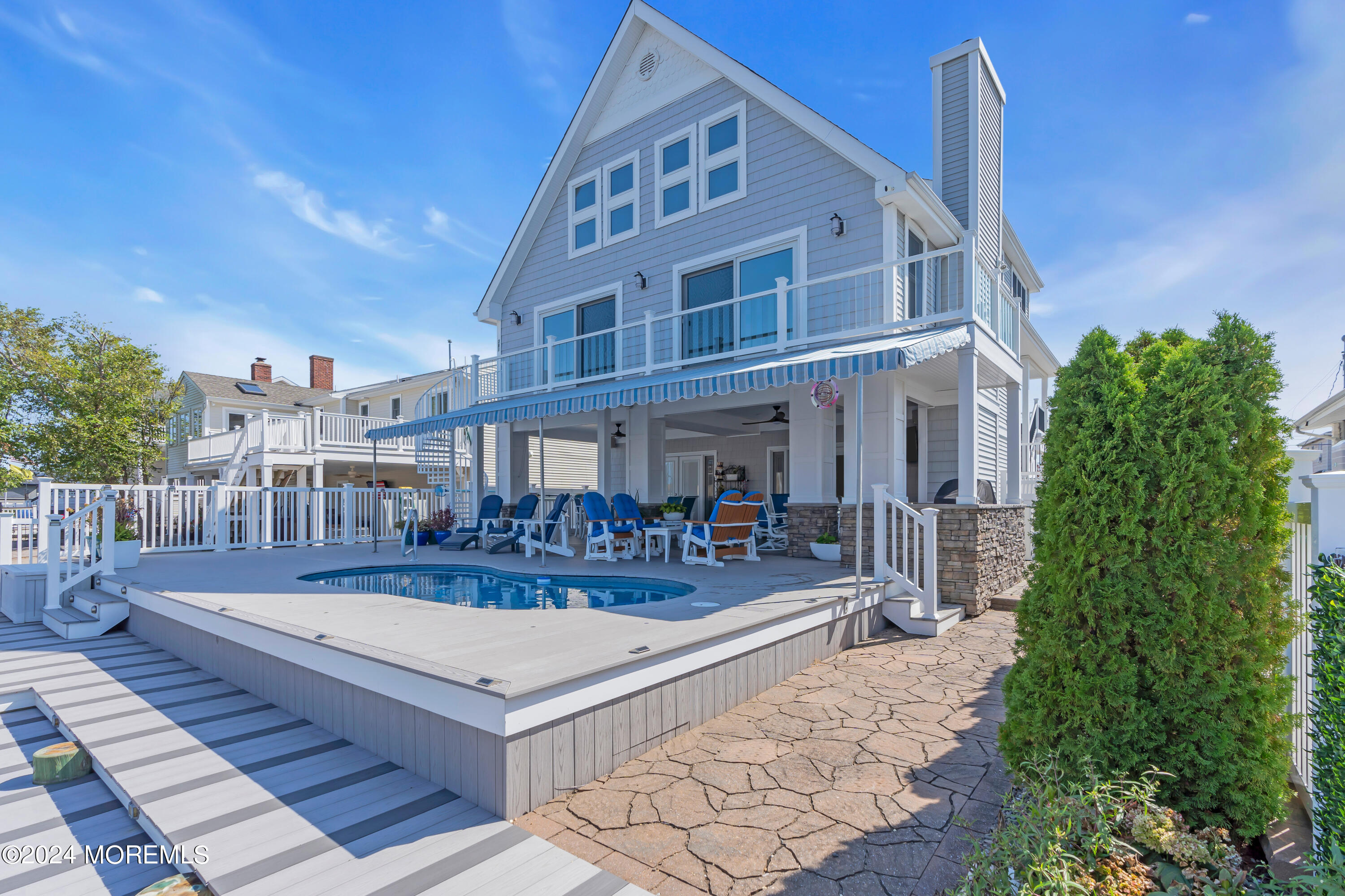 381 Aldo Drive Toms River, NJ 08753 - Photo 39 of 58 a view of a building with a patio