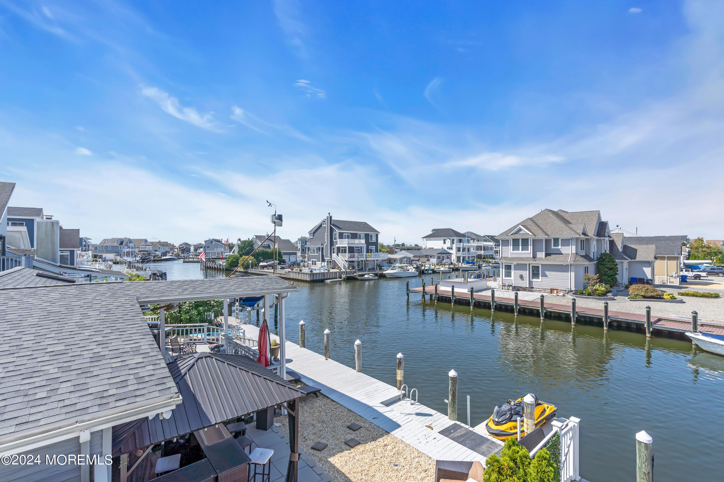 381 Aldo Drive Toms River, NJ 08753 - Photo 57 of 58 a view of a lake with sitting area