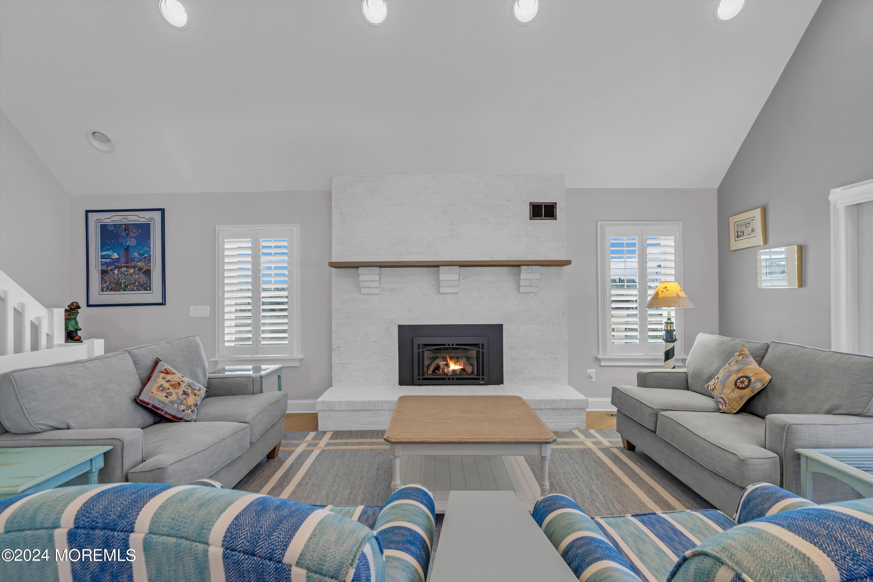 381 Aldo Drive Toms River, NJ 08753 - Photo 10 of 58 a living room with furniture and a fireplace