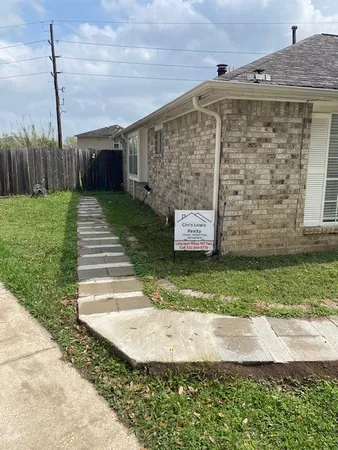 a view of a back yard of the house