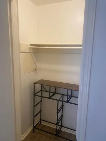 a kitchen with stainless steel appliances granite countertop a sink stove and microwave