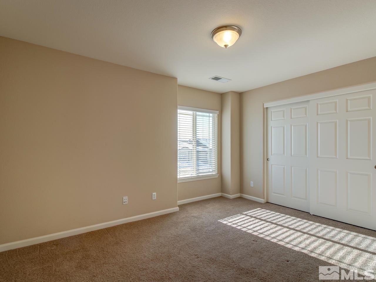 9055 Convair Way Reno, NV 89506 - Photo 13 of 24 a view of an empty room with a window
