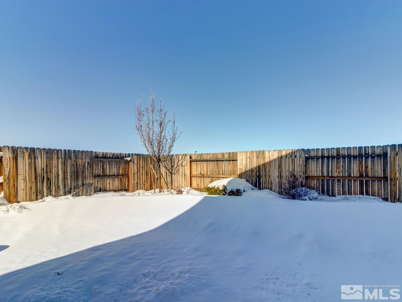 9055 Convair Way Reno, NV 89506 - Photo 24 of 24 a view of swimming pool with a yard