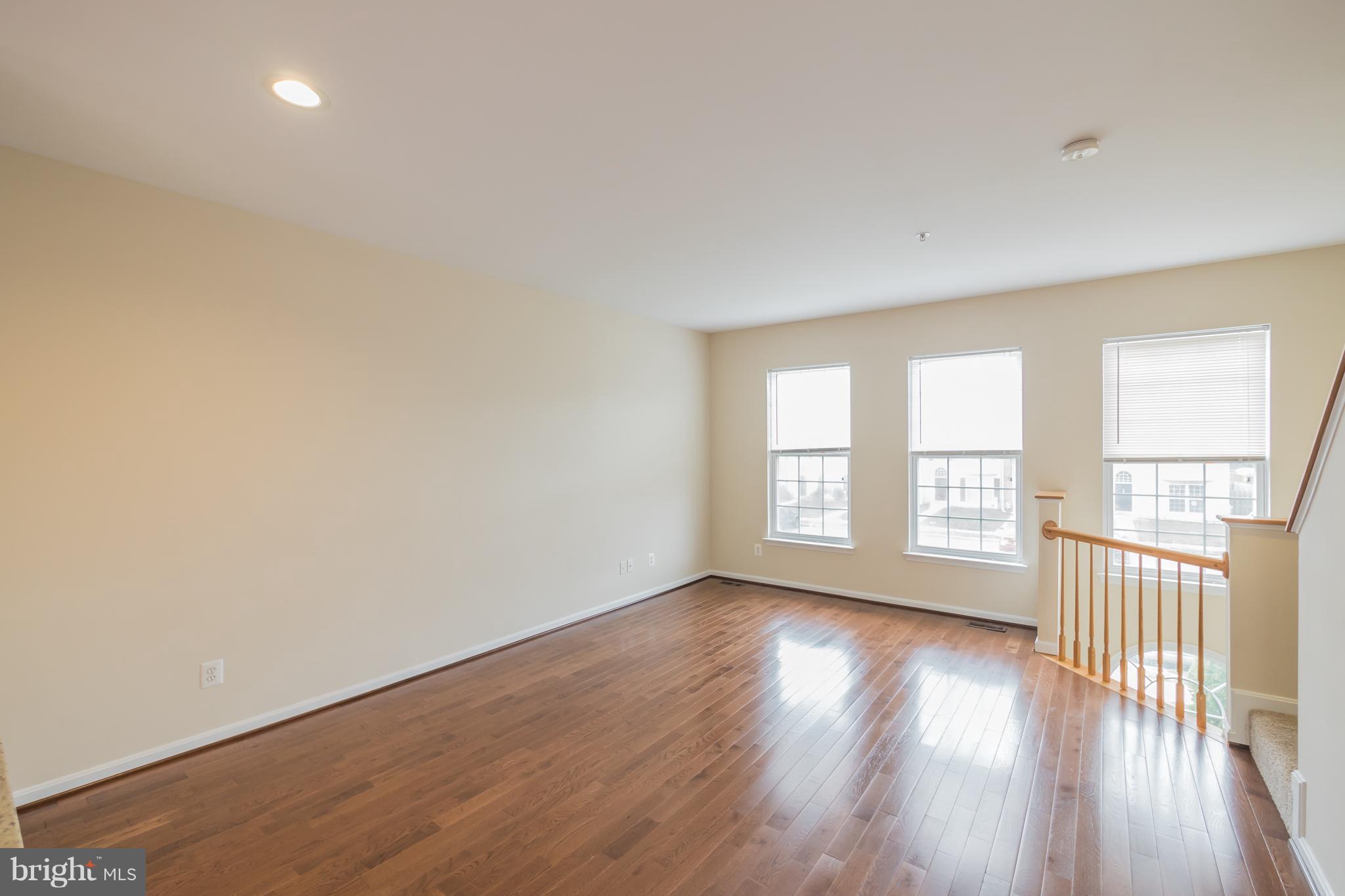 4124 Cutty Sark Road Baltimore, MD 21220 - Photo 9 of 24 Living room with new hardwood
