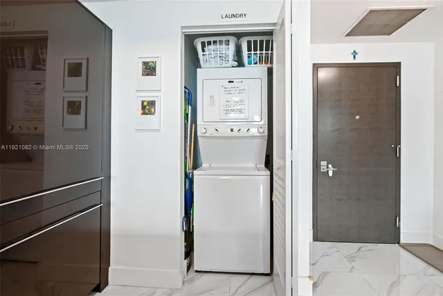 a bathroom with a shower and a sink