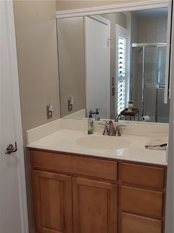 a room with mirror and window