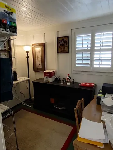 a view of a garden with a building in the background