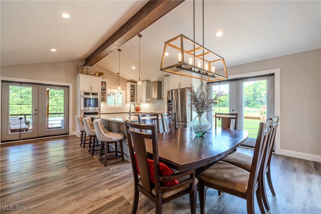6268 Summers Road Windsor, OH 44099 - Photo 25 of 49 Dining room with french doors, wood finished floors, recessed lighting, and baseboards