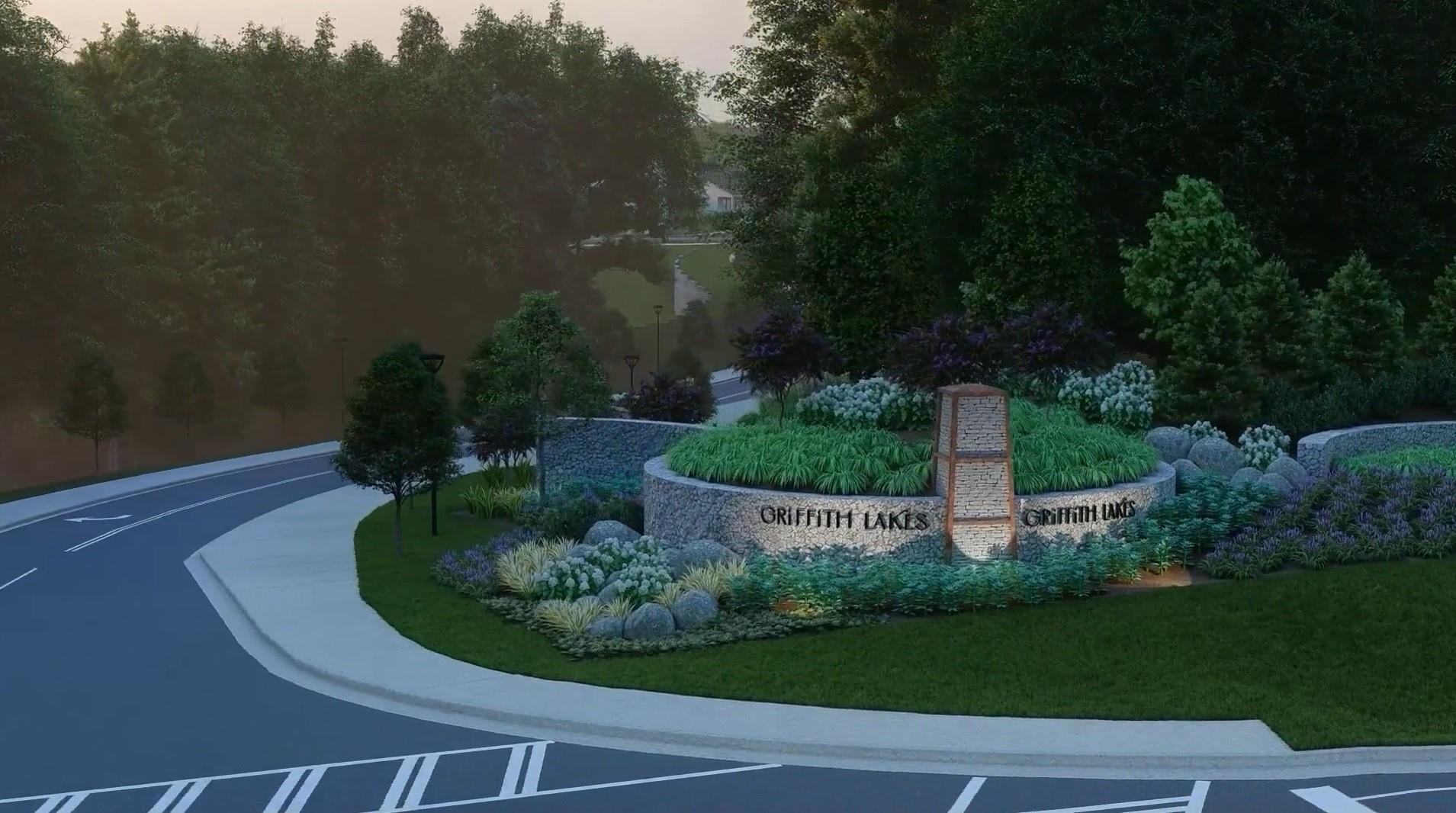 9700 Munsing Drive, Unit 183 Charlotte, NC 28269 - Photo 3 of 18 a view of a garden with a bench