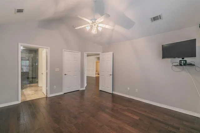 a view of a livingroom with a flat screen tv
