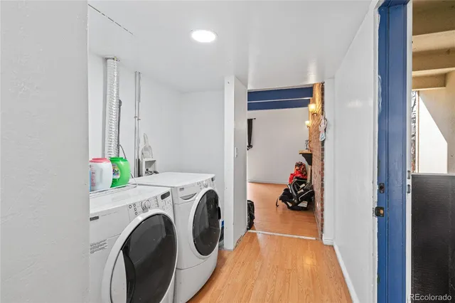 a view of hallway with washer and dryer