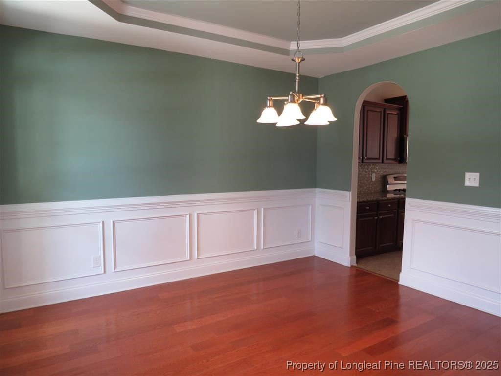 19 Turner Matthew Court Spring Lake, NC 28390 - Photo 12 of 20 a view of a kitchen with wooden cabinet and stainless steel appliances