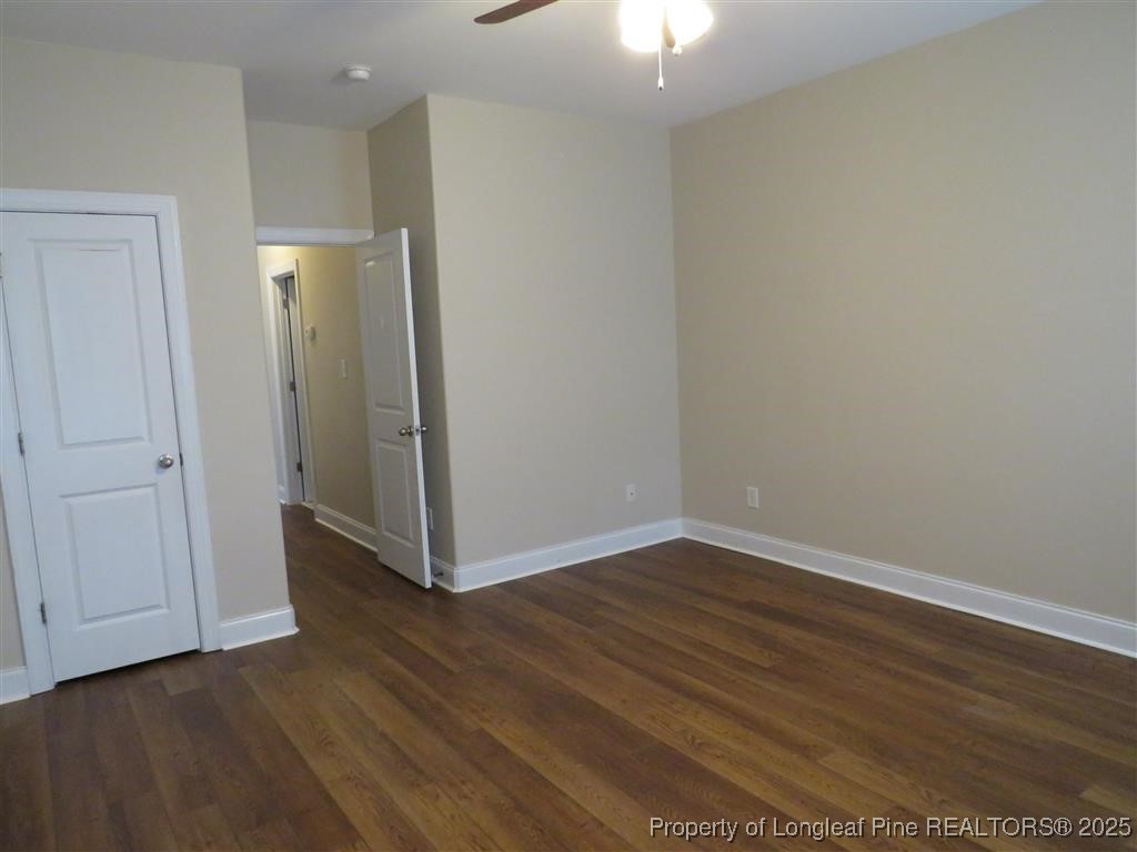 19 Turner Matthew Court Spring Lake, NC 28390 - Photo 14 of 20 a view of an empty room with wooden floor