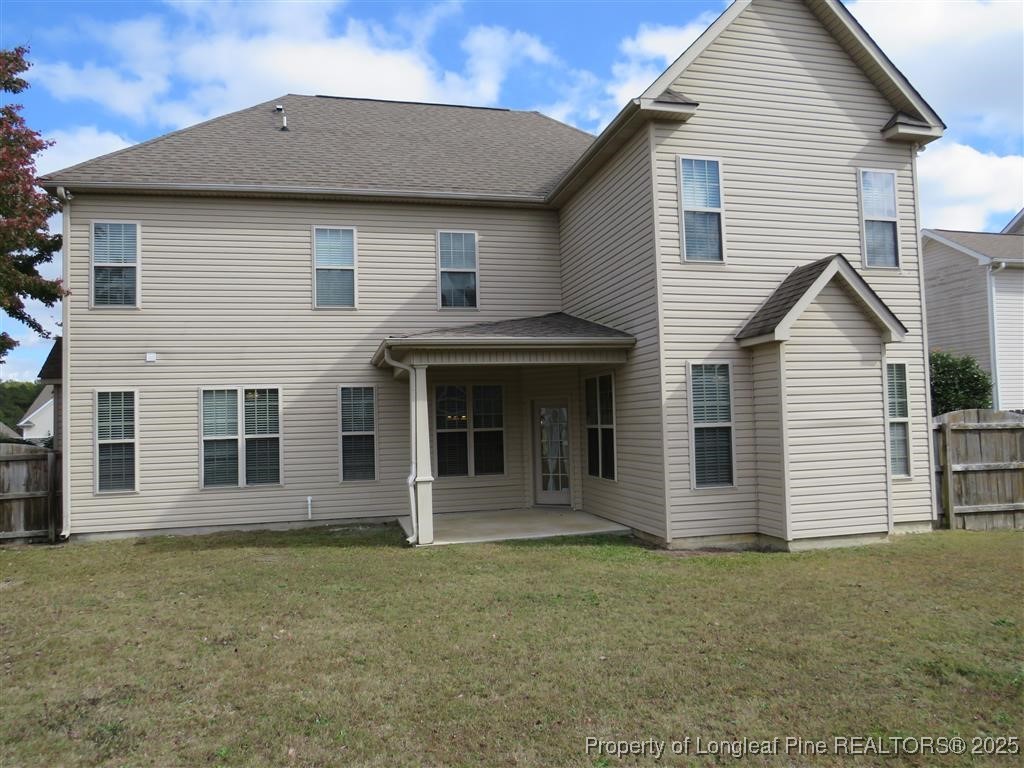 19 Turner Matthew Court Spring Lake, NC 28390 - Photo 20 of 20 a front view of a house with a garden