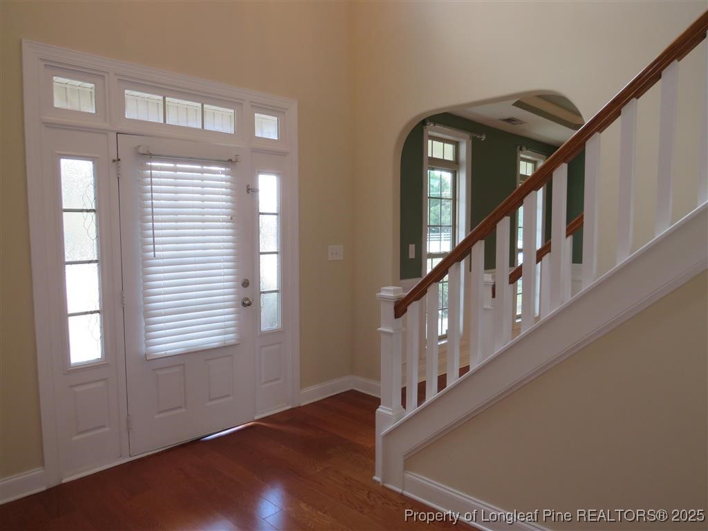 19 Turner Matthew Court Spring Lake, NC 28390 - Photo 2 of 20 a view of an entryway wooden floor and windows