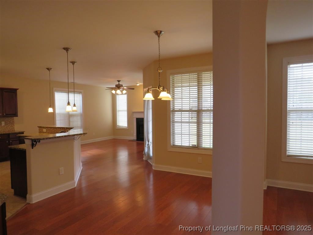 19 Turner Matthew Court Spring Lake, NC 28390 - Photo 5 of 20 a view of a kitchen with wooden floor and a window