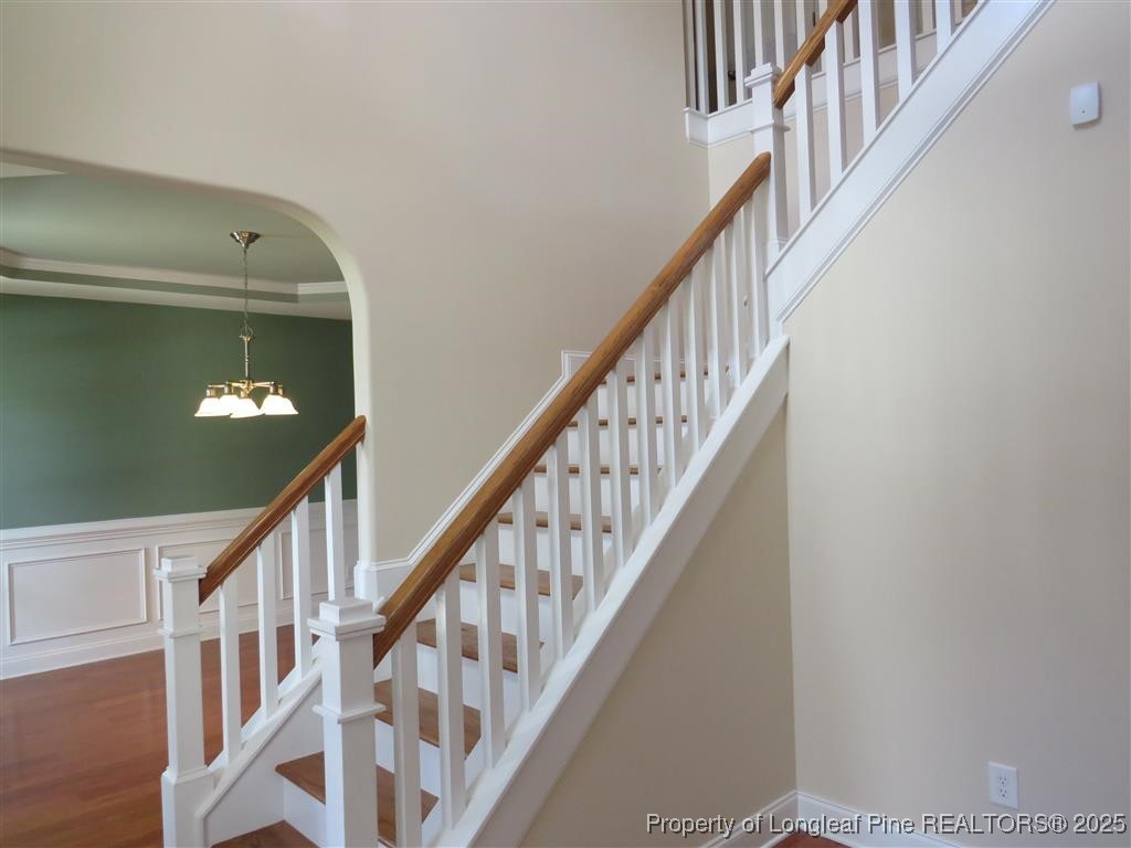 19 Turner Matthew Court Spring Lake, NC 28390 - Photo 10 of 20 a view of staircase with railing and white walls