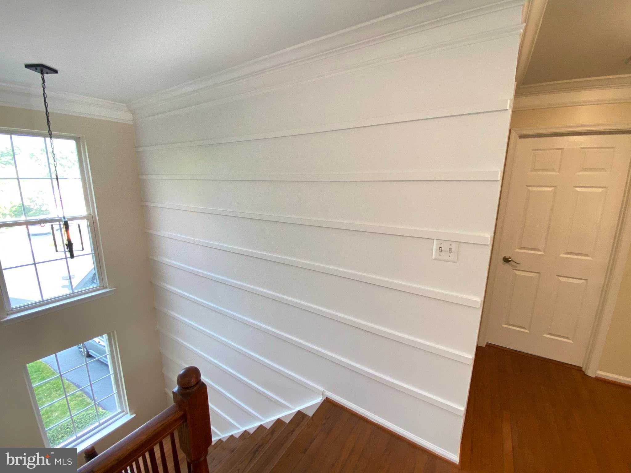 2408 Ripplemeade Court Herndon, VA 20171 - Photo 16 of 36 a view of empty room with wooden floor and fan