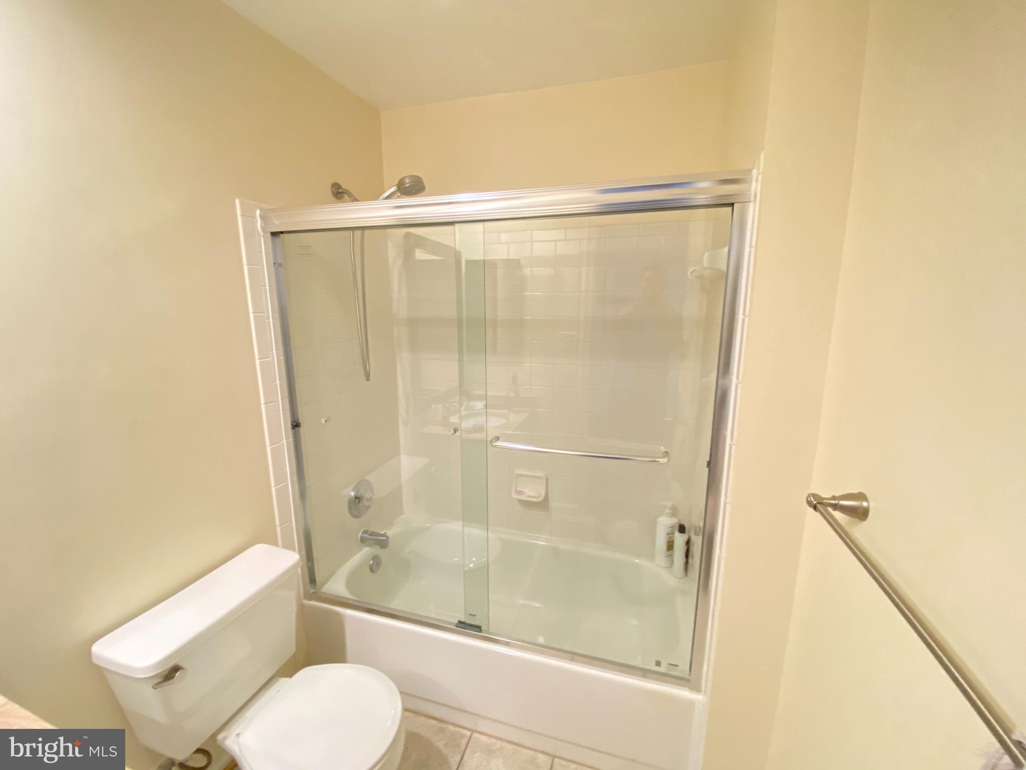 2408 Ripplemeade Court Herndon, VA 20171 - Photo 24 of 36 a bathroom with a shower and a toilet