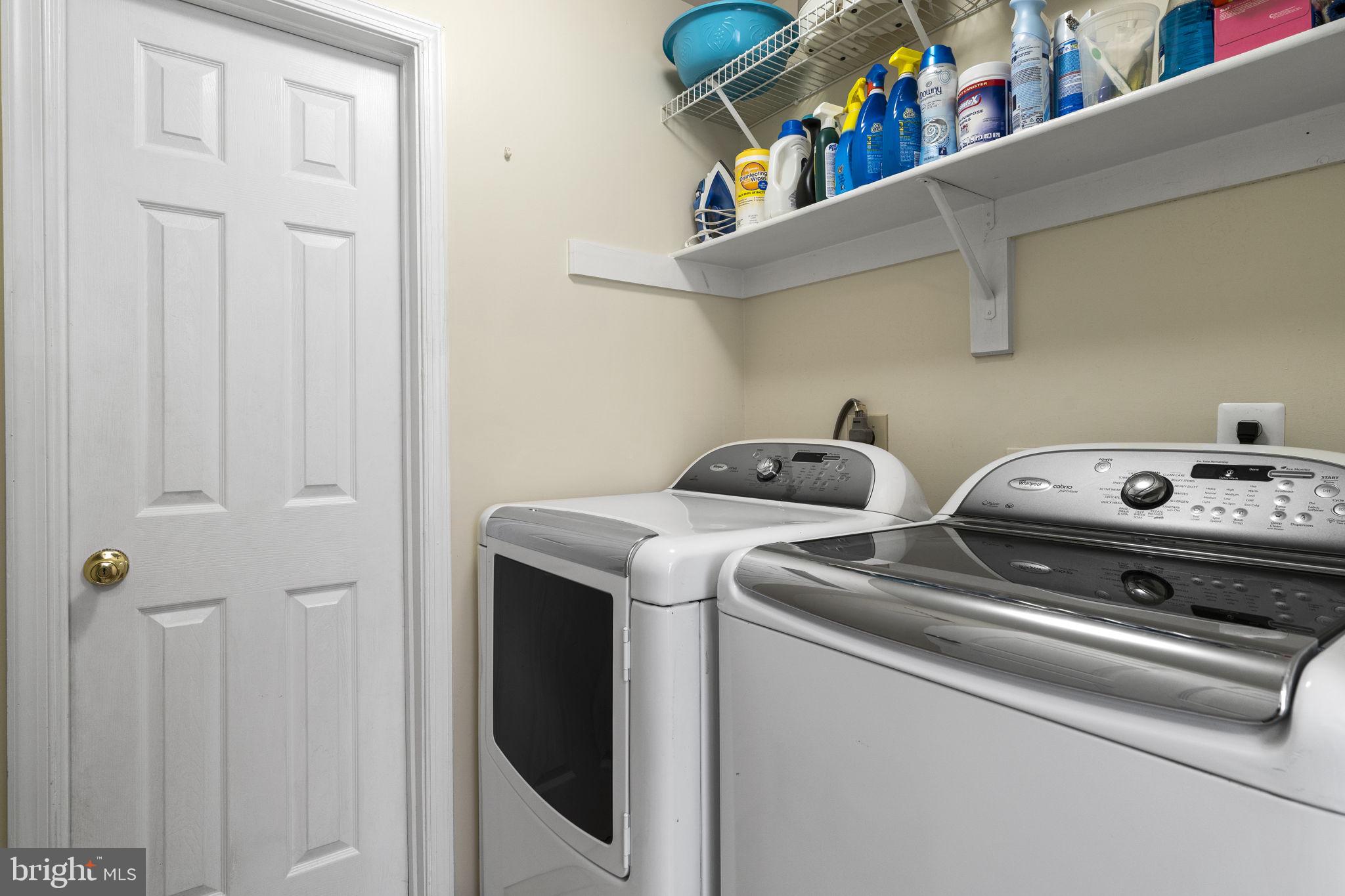 2408 Ripplemeade Court Herndon, VA 20171 - Photo 27 of 36 a utility room with dryer and washer