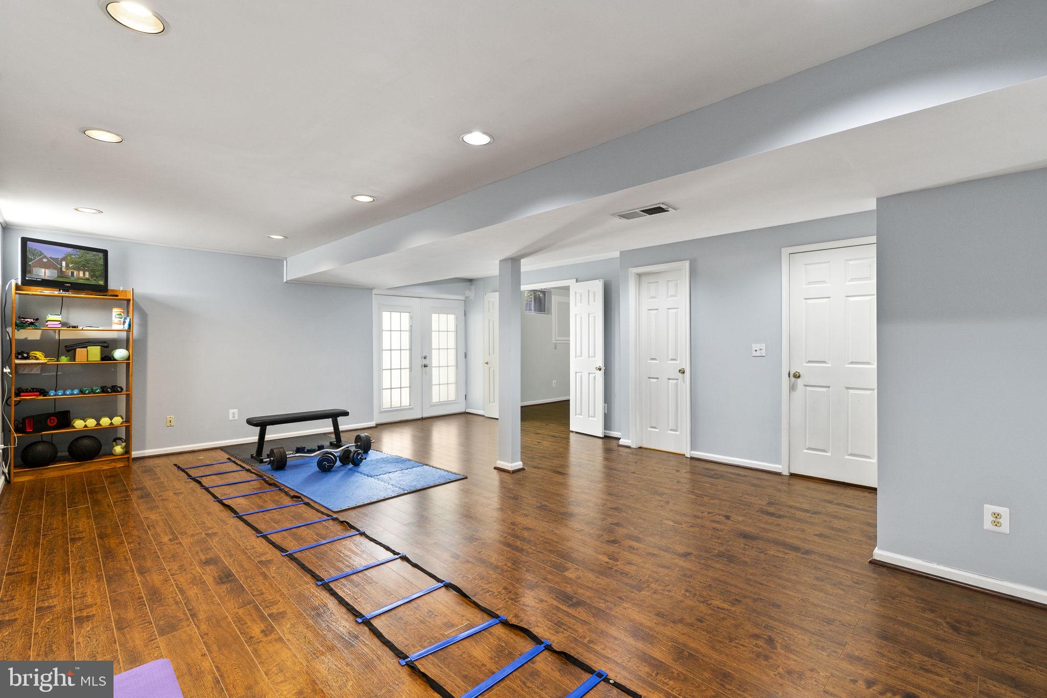 2408 Ripplemeade Court Herndon, VA 20171 - Photo 29 of 36 a view of a workspace with furniture and a window