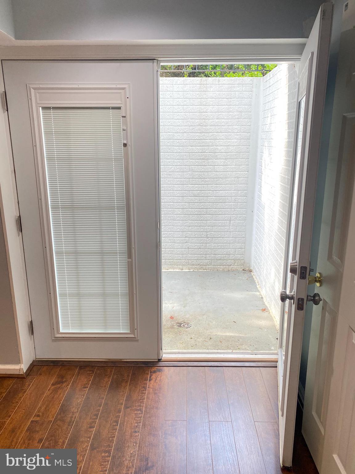 2408 Ripplemeade Court Herndon, VA 20171 - Photo 33 of 36 a view of a small space with wooden floor and a window
