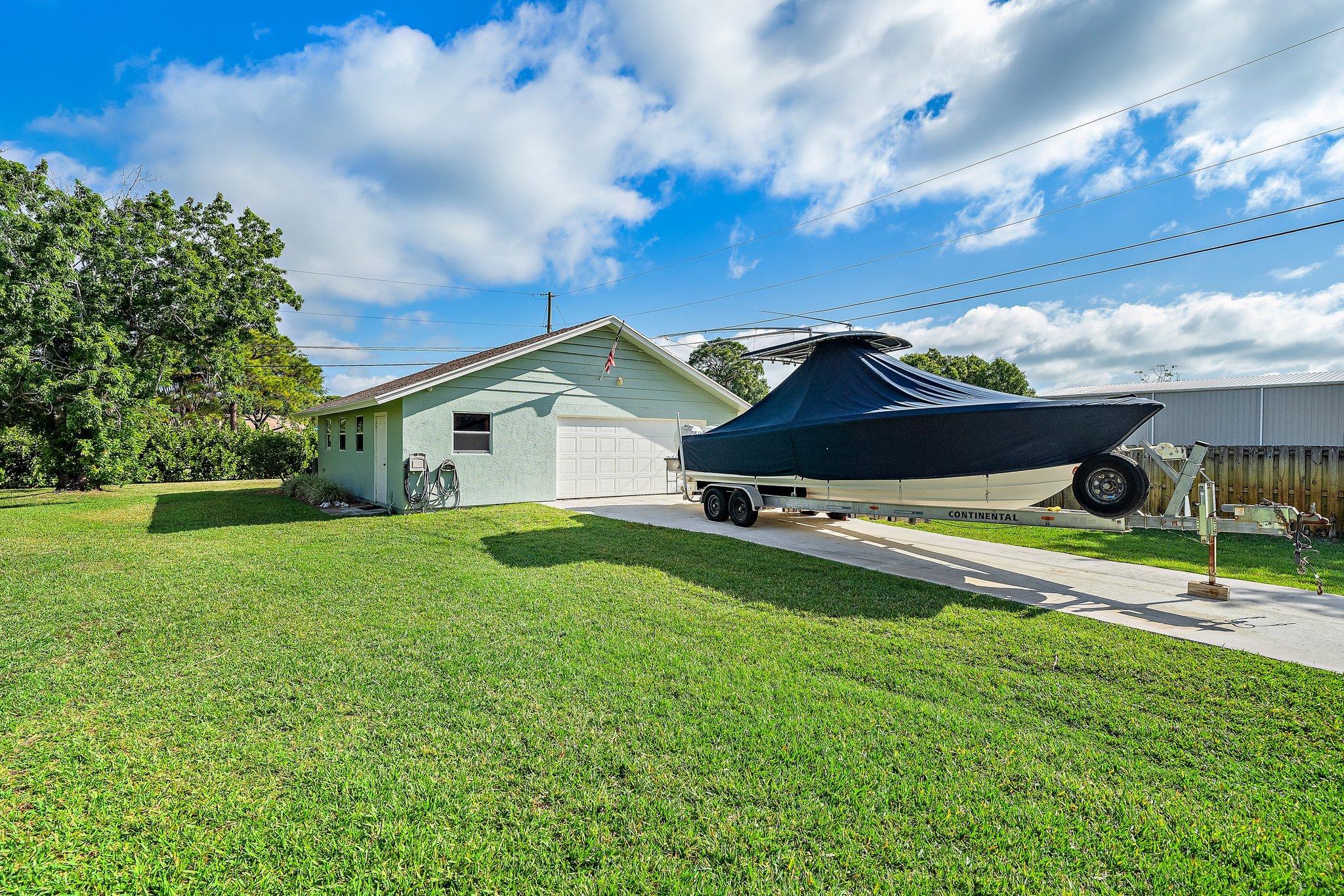5895 Keith Road Jupiter, FL 33458 - Photo 47 of 62 010-5895KeithRoad-Jupiter-FL-33458-SMALL