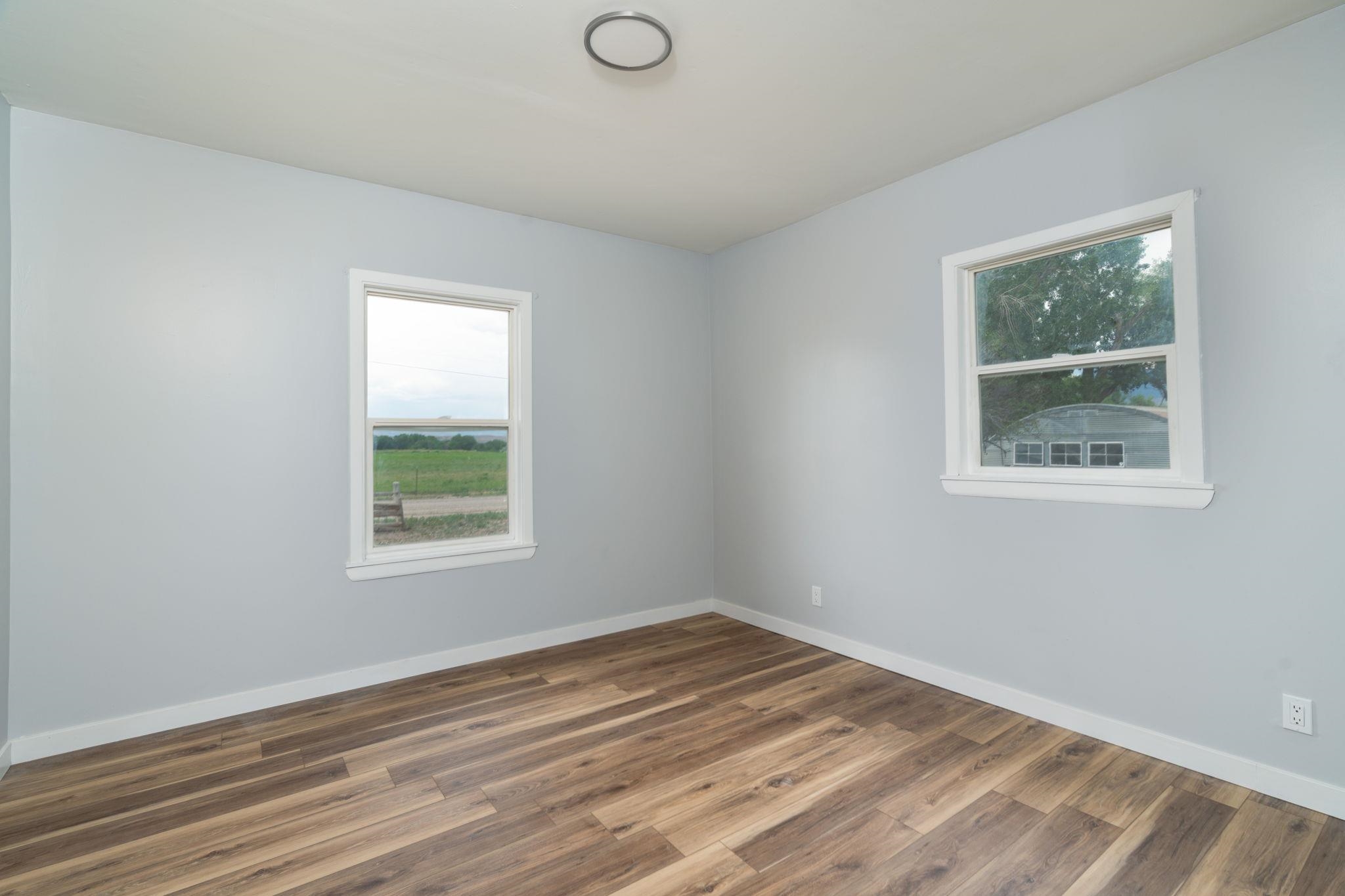 6038 Townsend Road Delta, CO 81416 - Photo 16 of 42 an empty room with a window