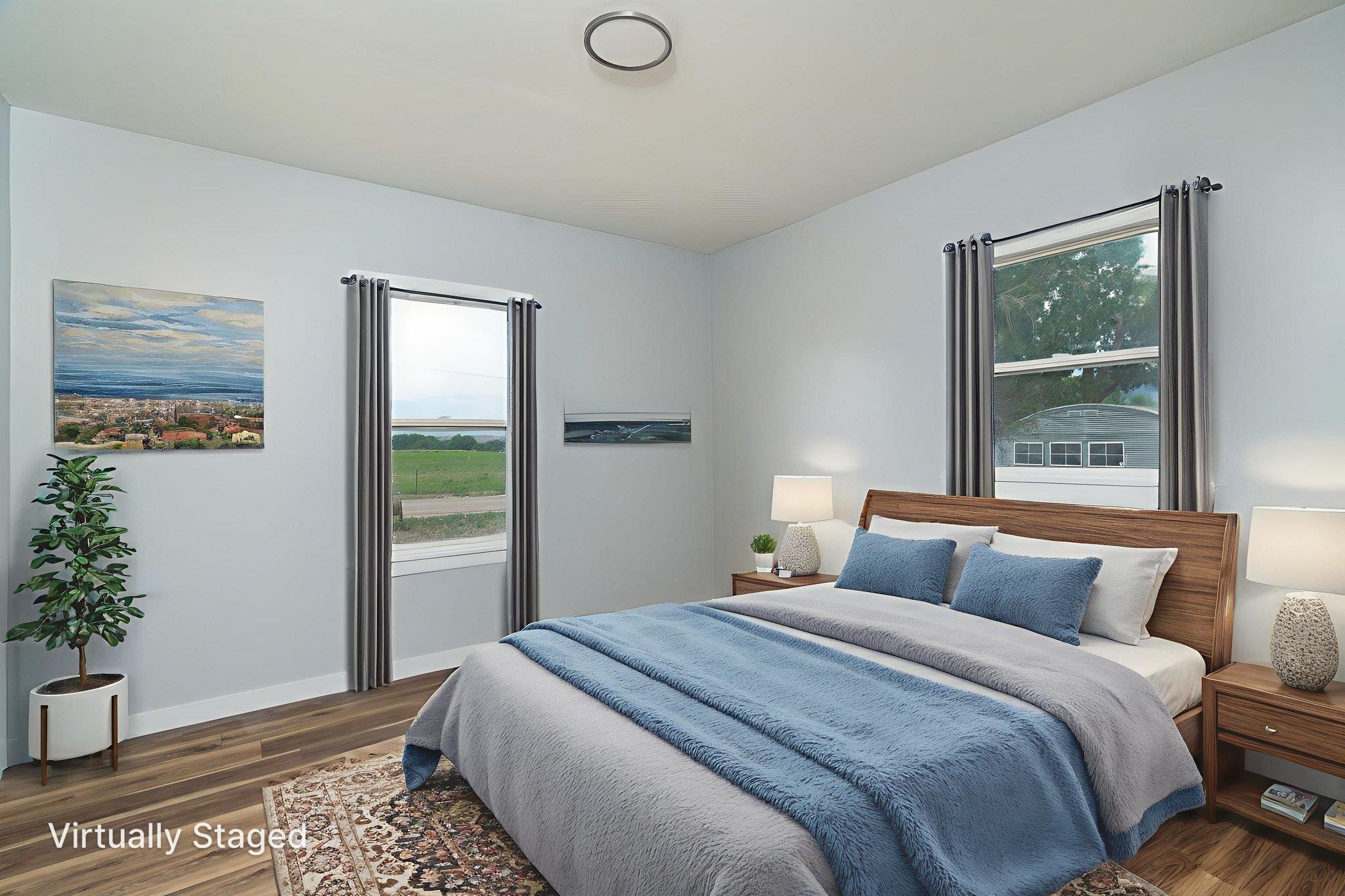 6038 Townsend Road Delta, CO 81416 - Photo 17 of 42 a bedroom with a bed and a window