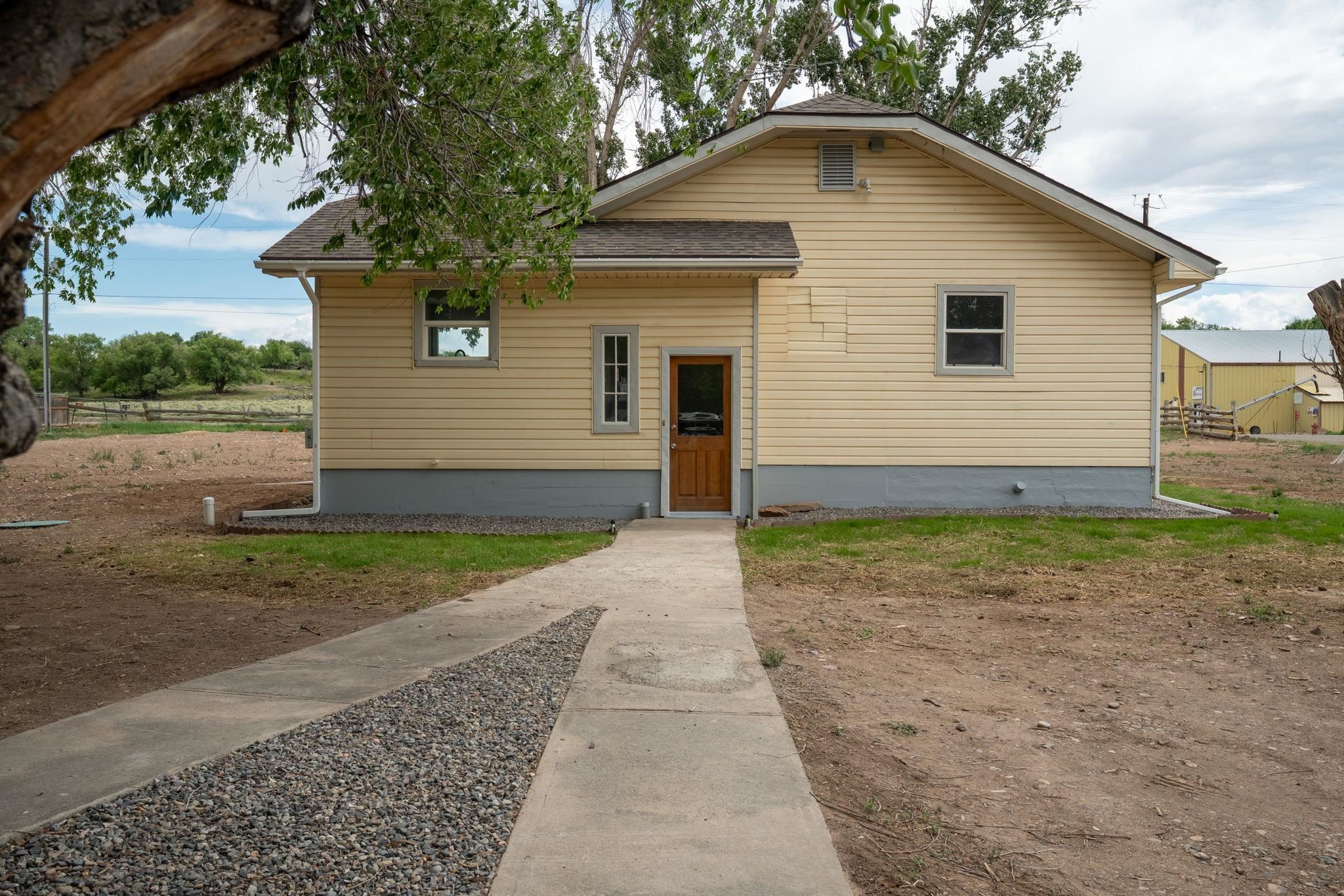 6038 Townsend Road Delta, CO 81416 - Photo 2 of 42 a view of backyard of house