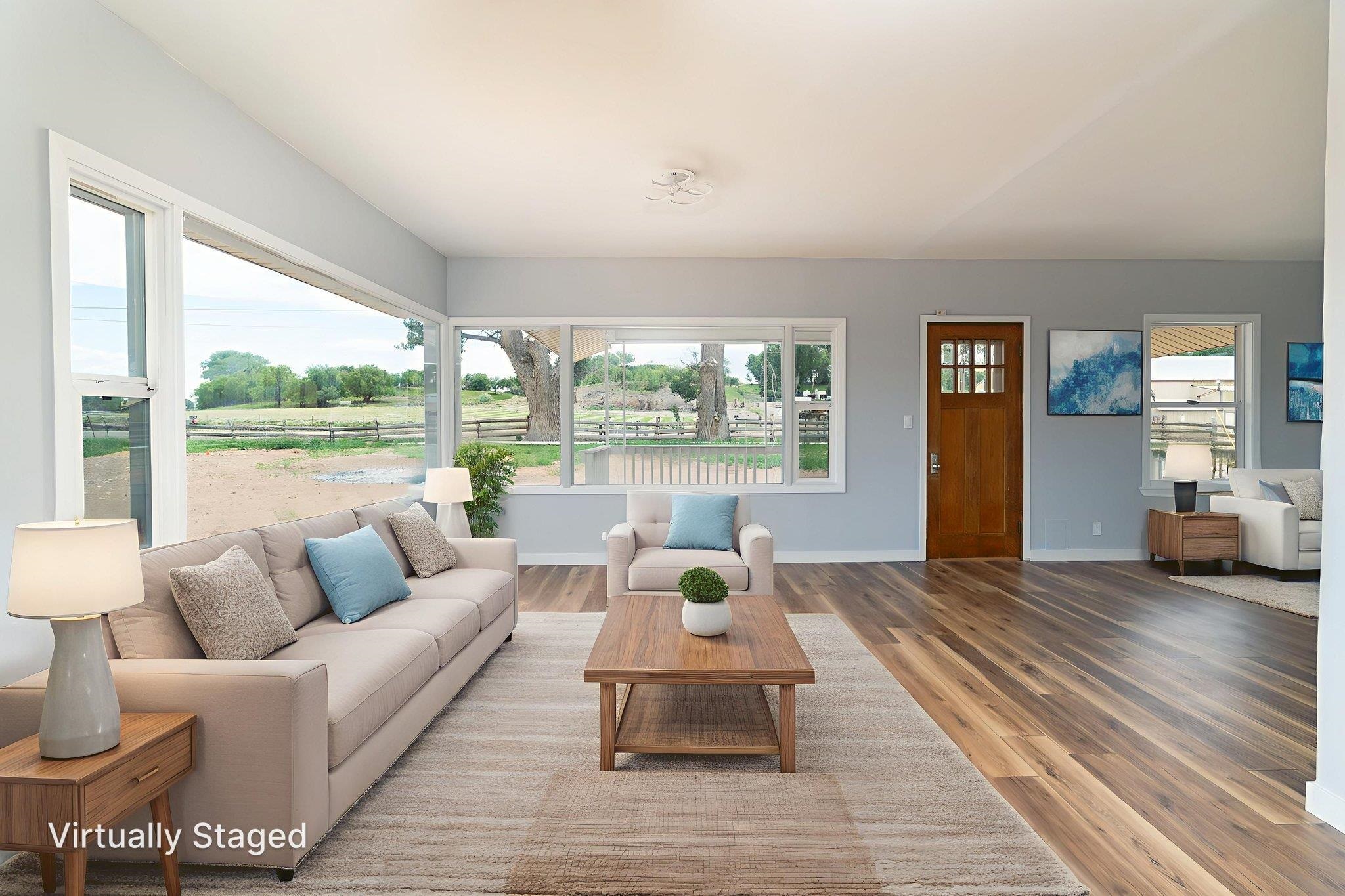 6038 Townsend Road Delta, CO 81416 - Photo 9 of 42 a living room with furniture and a large window