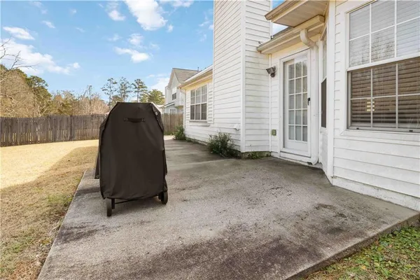 a view of a back yard of the house