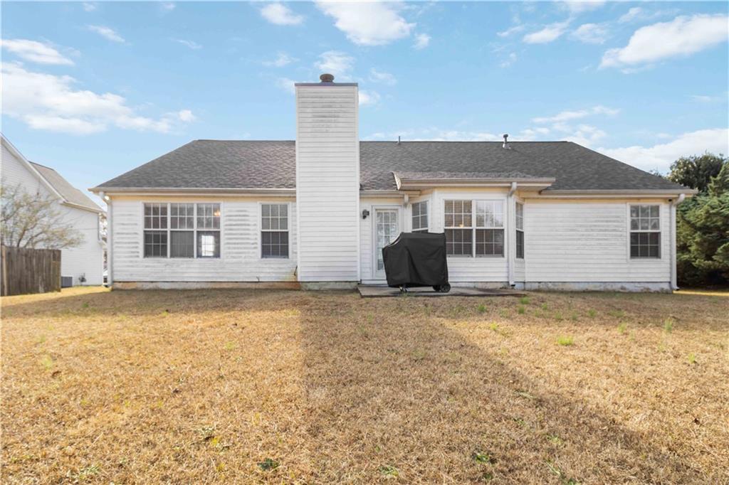 101 River View Court Hampton, GA 30228 - Photo 25 of 29 a house with a swimming pool
