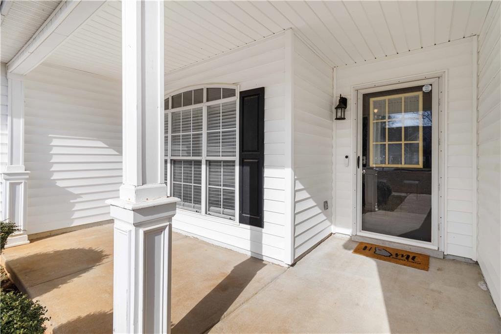 101 River View Court Hampton, GA 30228 - Photo 4 of 29 a view of front door of house with stairs