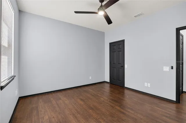 a view of a yard with an outdoor seating