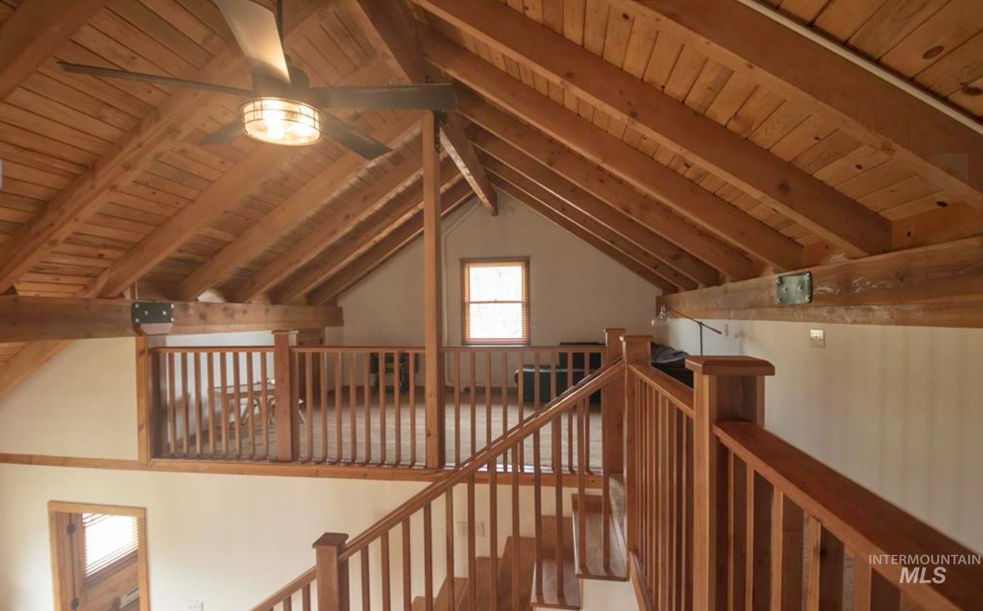2609 Highway 95 Council, ID 83612 - Photo 12 of 49 Staircase featuring a wood ceiling with exposed beams