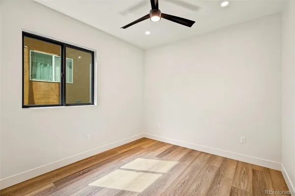 a kitchen with stainless steel appliances a refrigerator sink and microwave