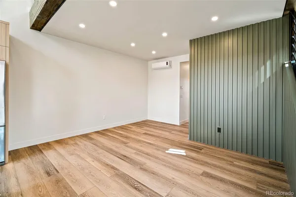a view of a livingroom with a wooden floor