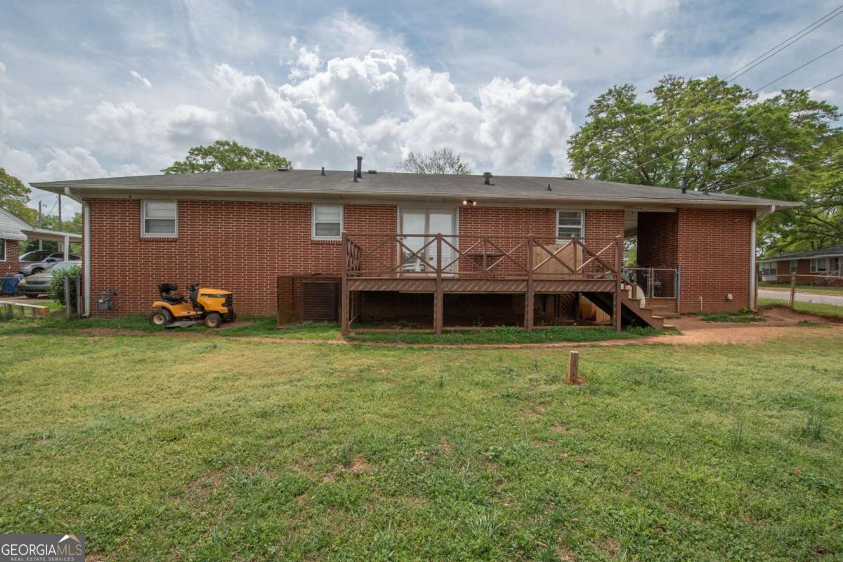 313 Mobley Street Griffin, GA 30223 - Photo 21 of 22 a front view of a house with garden