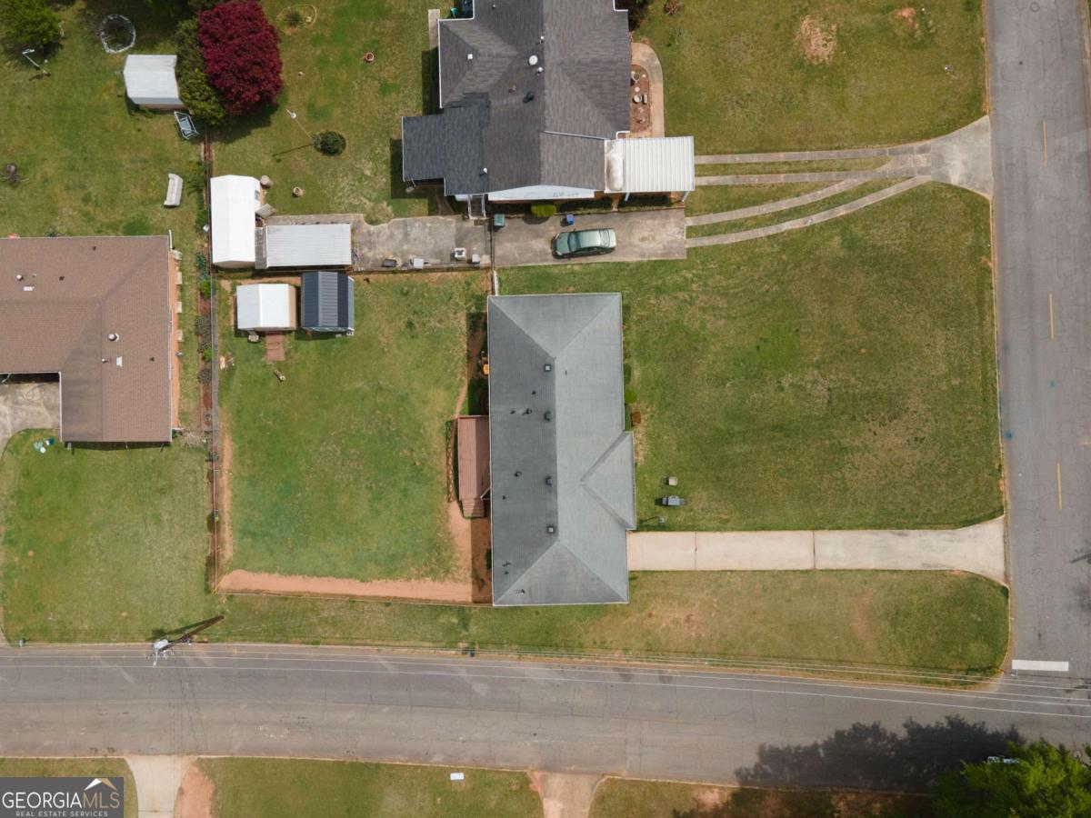 313 Mobley Street Griffin, GA 30223 - Photo 4 of 22 an aerial view of a house with a yard