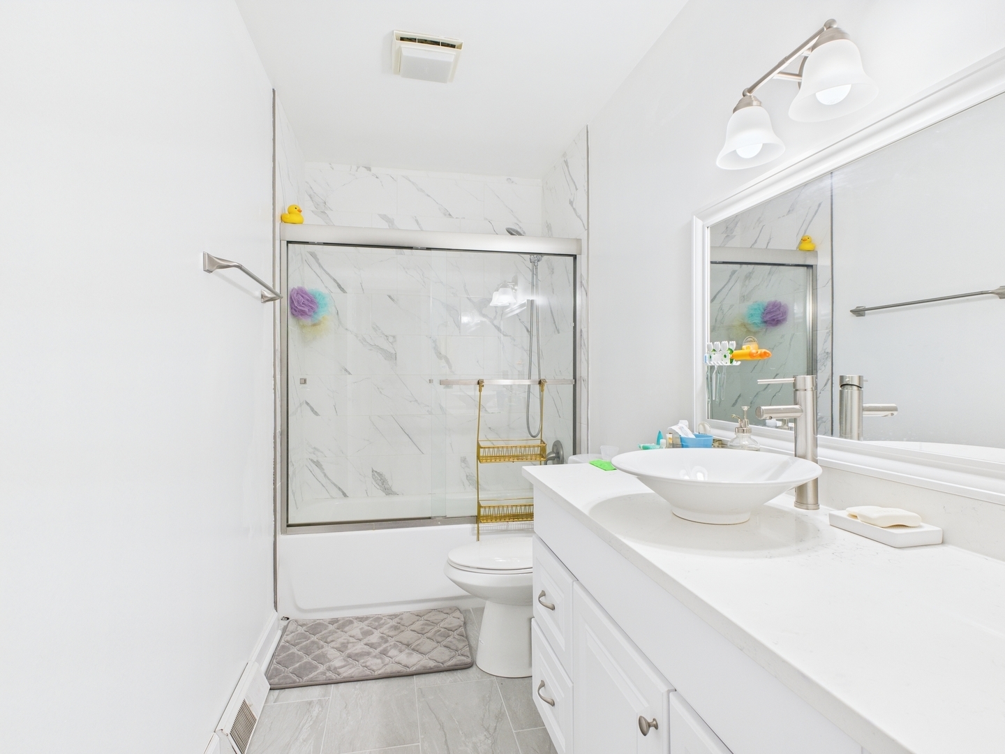 15840 Overlook Lane Huntley, IL 60142 - Photo 17 of 42 a bathroom with a sink a toilet and shower