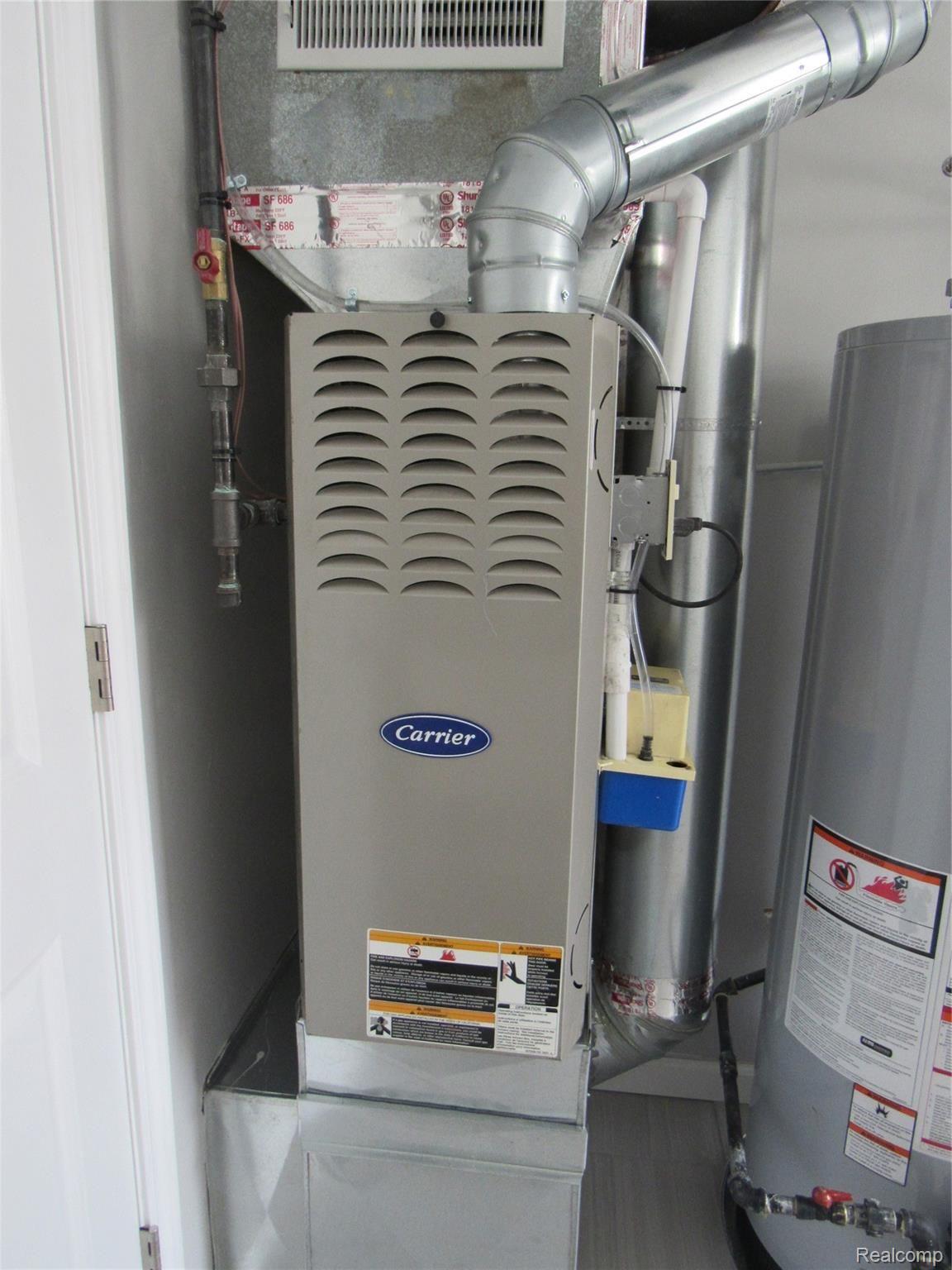6764 Harding Street Taylor, MI 48180 - Photo 34 of 37 Carrier furnace!!
